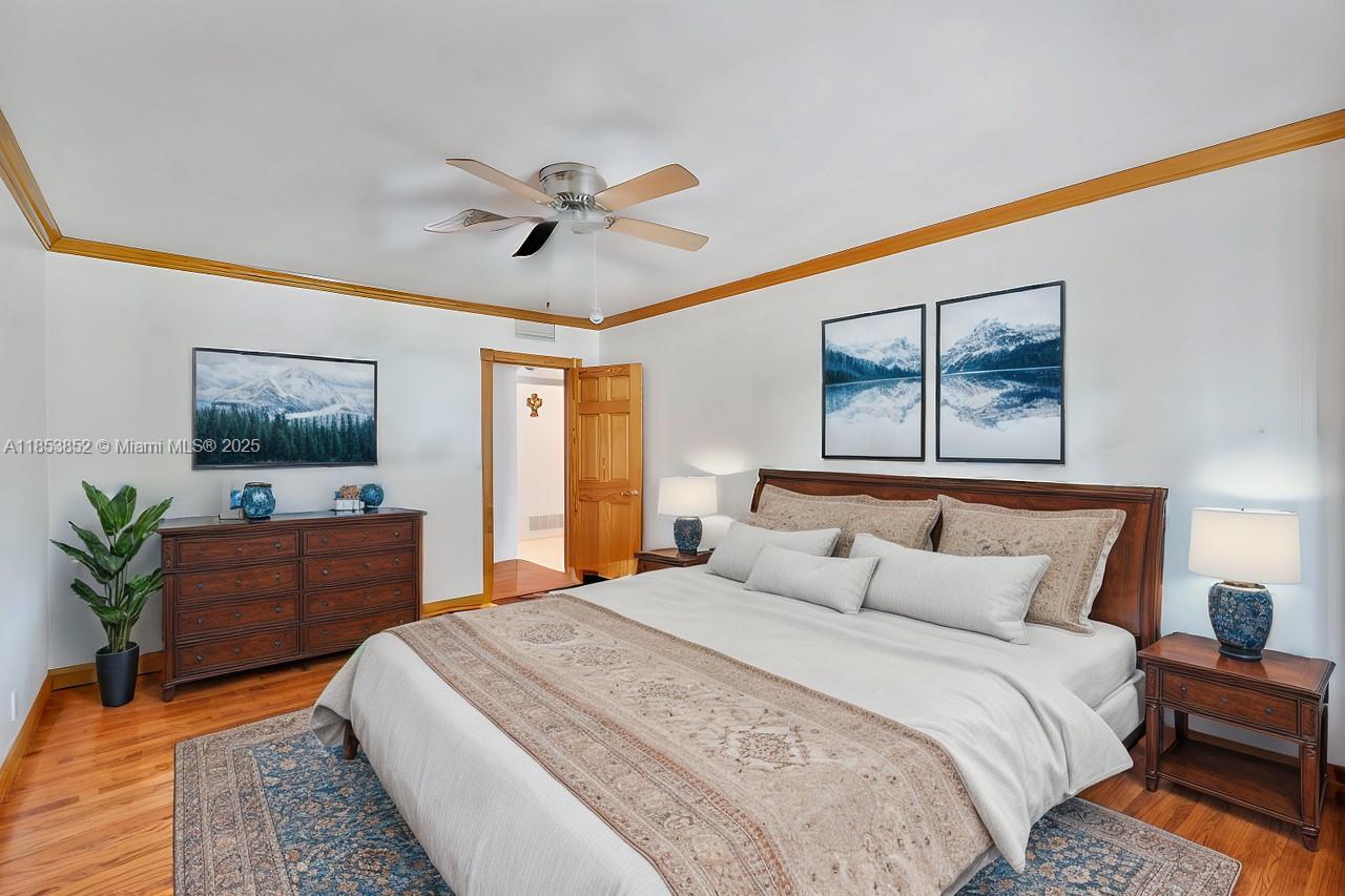 13000 Old Cutler Road Pinecrest, FL 33156 - Photo 20 of 43 a bedroom with a bed and a dresser