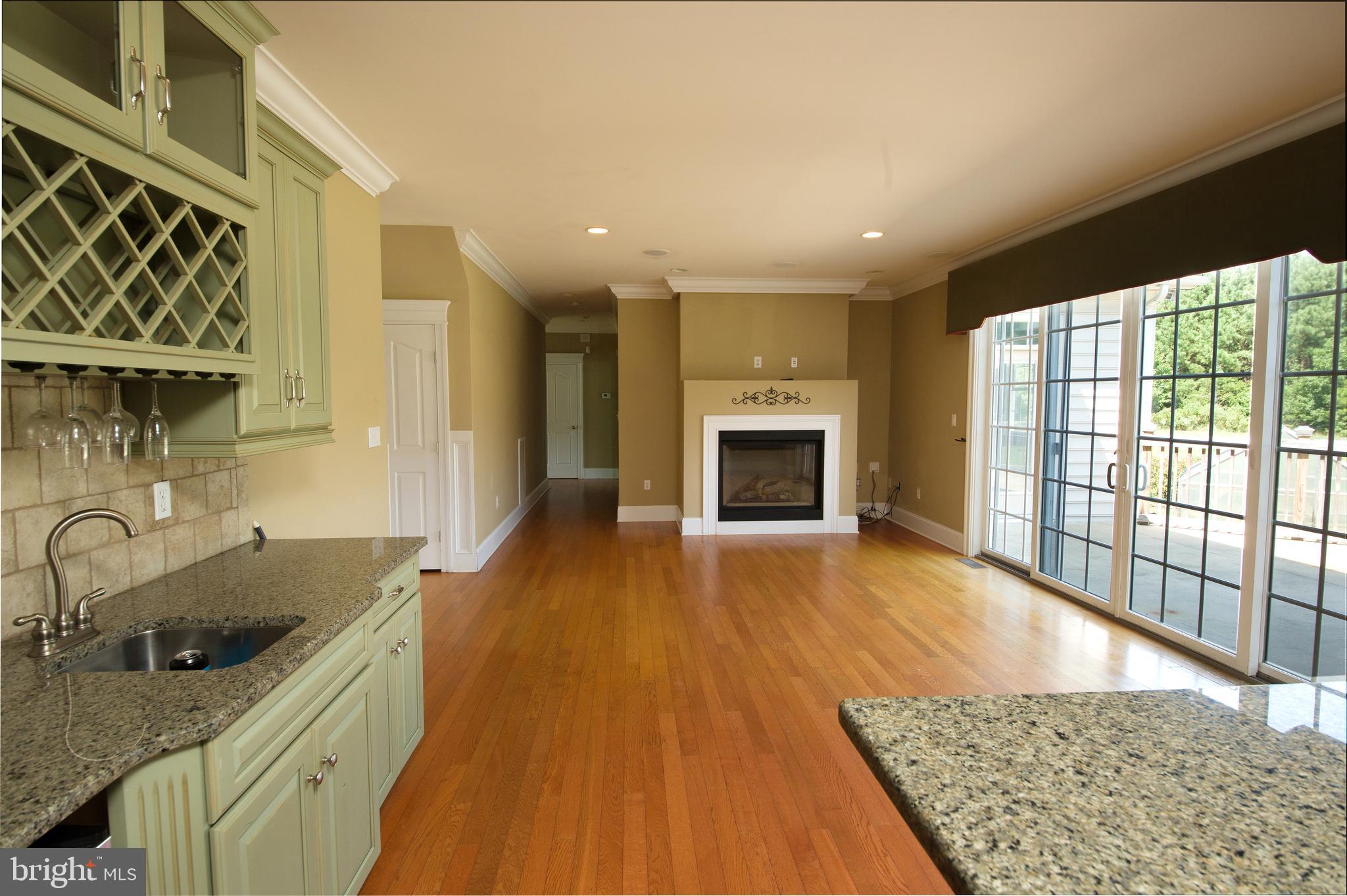 10311 Clarence Barnes Road Princess Anne, MD 21853 - Photo 16 of 44 Wet Bar looking into family room from kitchen