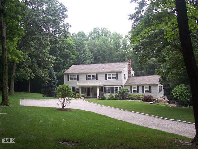 116 Old Redding Road Weston, CT 06883 - Photo 1 of 1 a front view of a house with a yard