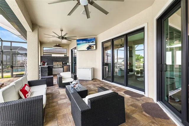 a kitchen with stainless steel appliances granite countertop a stove and a refrigerator