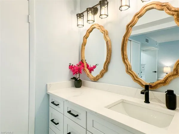 a view of a porch with furniture and outside area