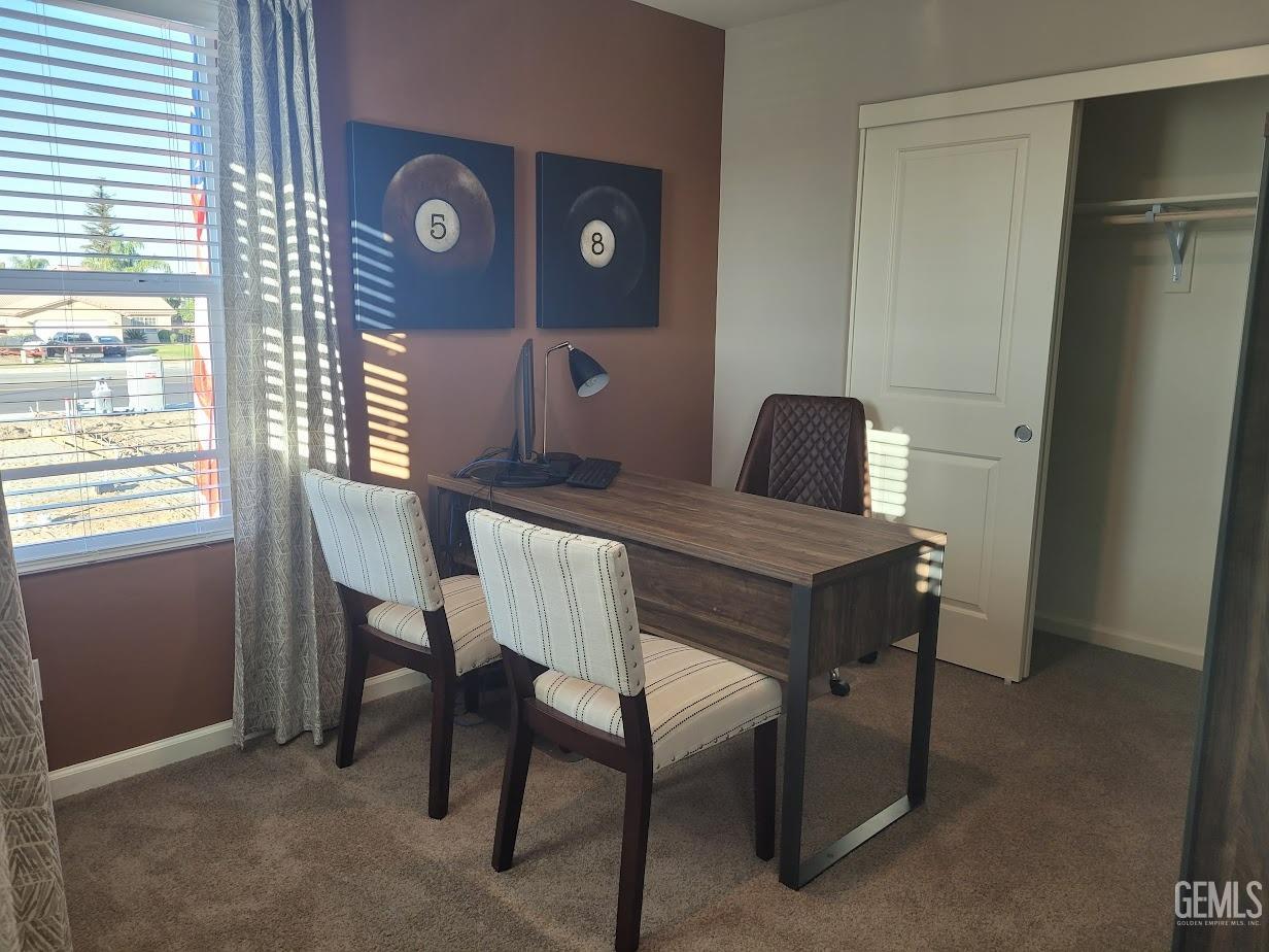 Undisclosed Address Bakersfield, CA 93313 - Photo 11 of 25 a view of a dining room with furniture and a window