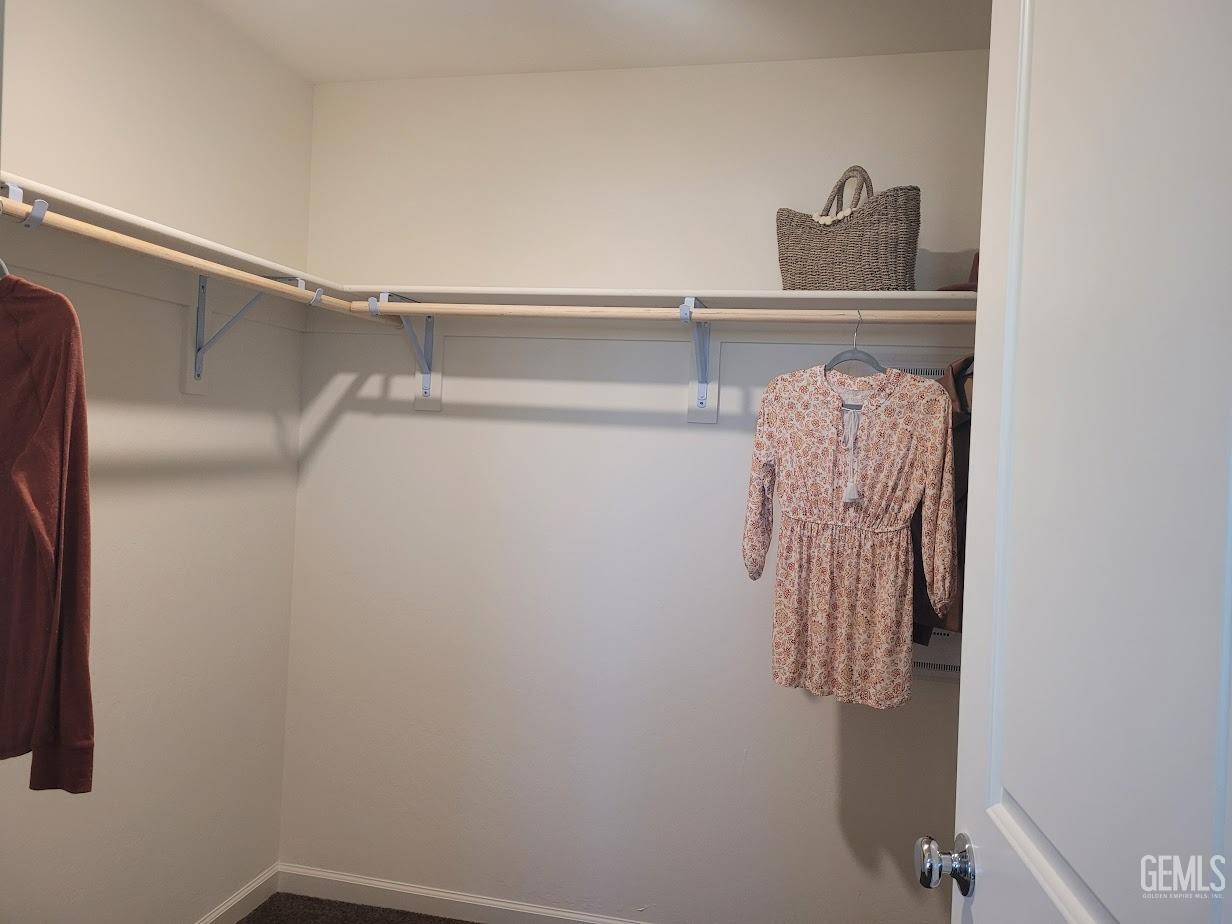 Undisclosed Address Bakersfield, CA 93313 - Photo 17 of 25 a view of small space with racks on the wall