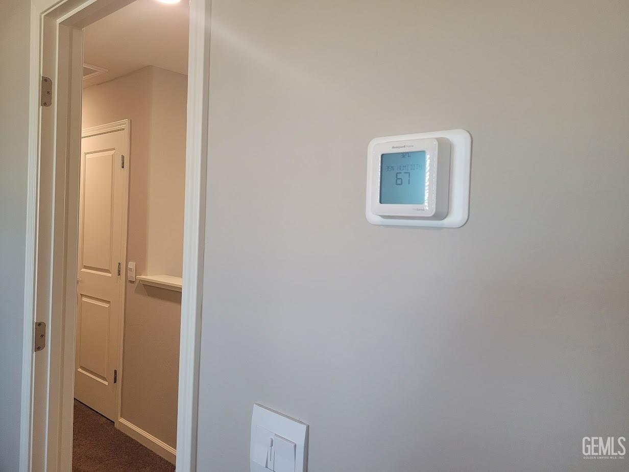 Undisclosed Address Bakersfield, CA 93313 - Photo 18 of 25 a room with a door