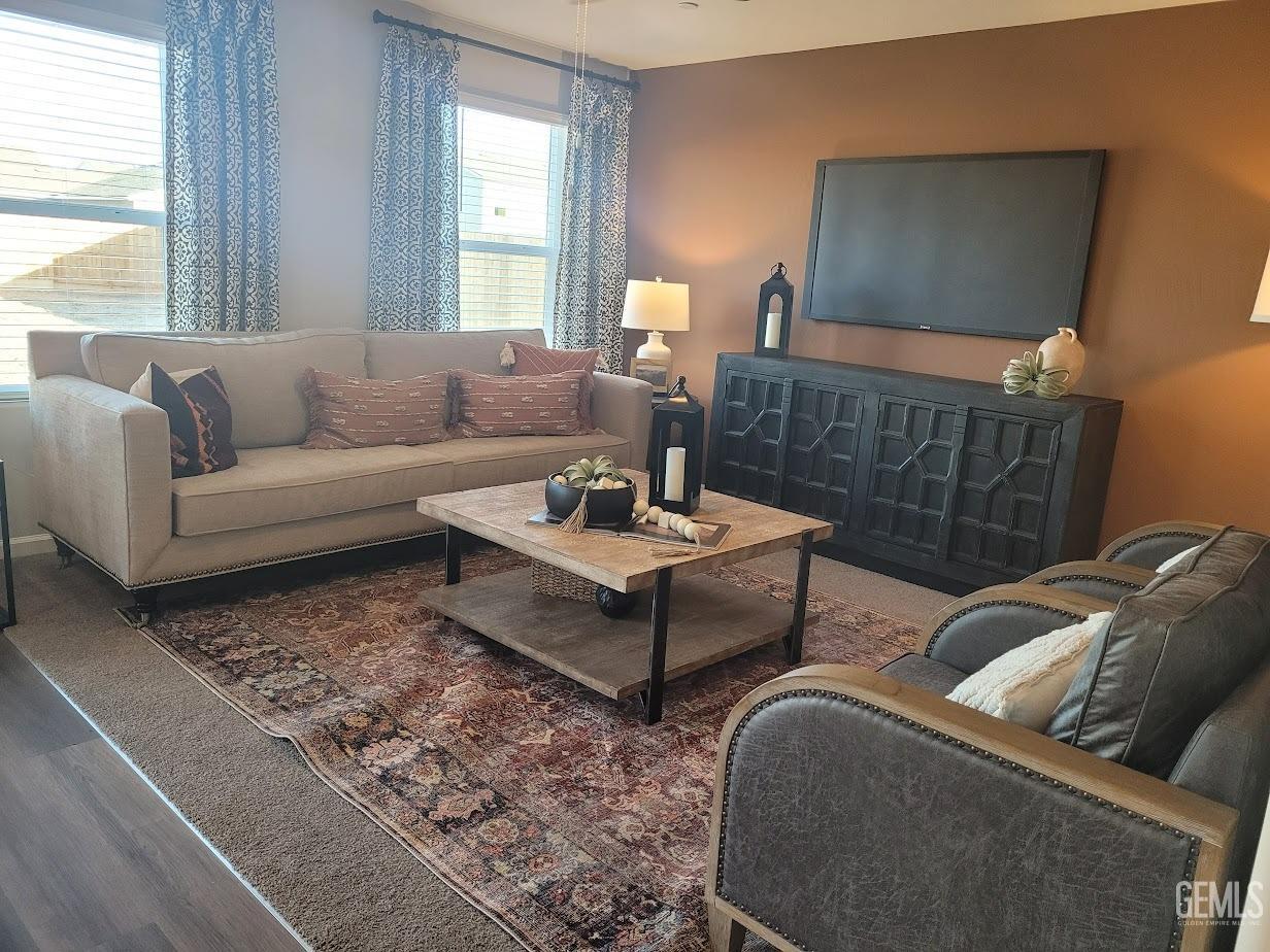 Undisclosed Address Bakersfield, CA 93313 - Photo 7 of 25 a living room with furniture and a window