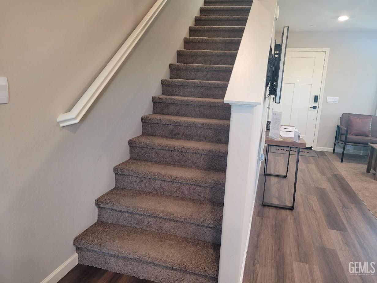 Undisclosed Address Bakersfield, CA 93313 - Photo 10 of 25 a view of entryway and hall with wooden floor