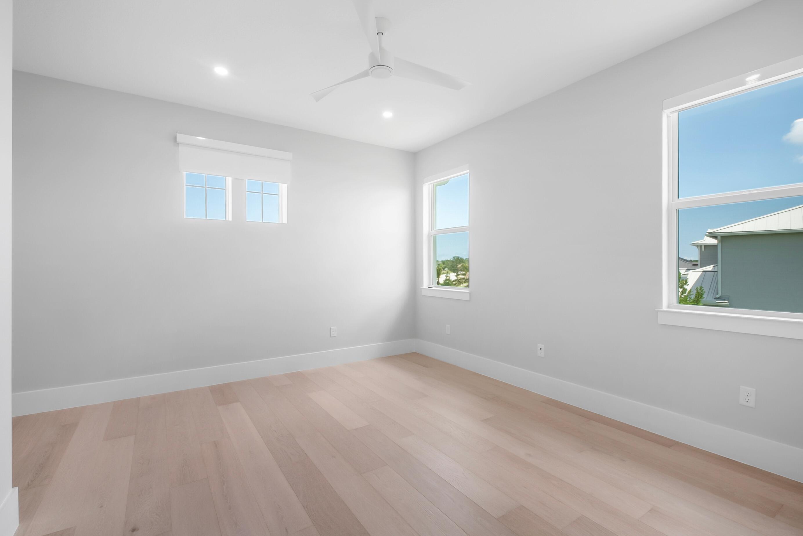 20060 Southeast Bridgewater Drive Jupiter, FL 33458 - Photo 36 of 68 an empty room with windows