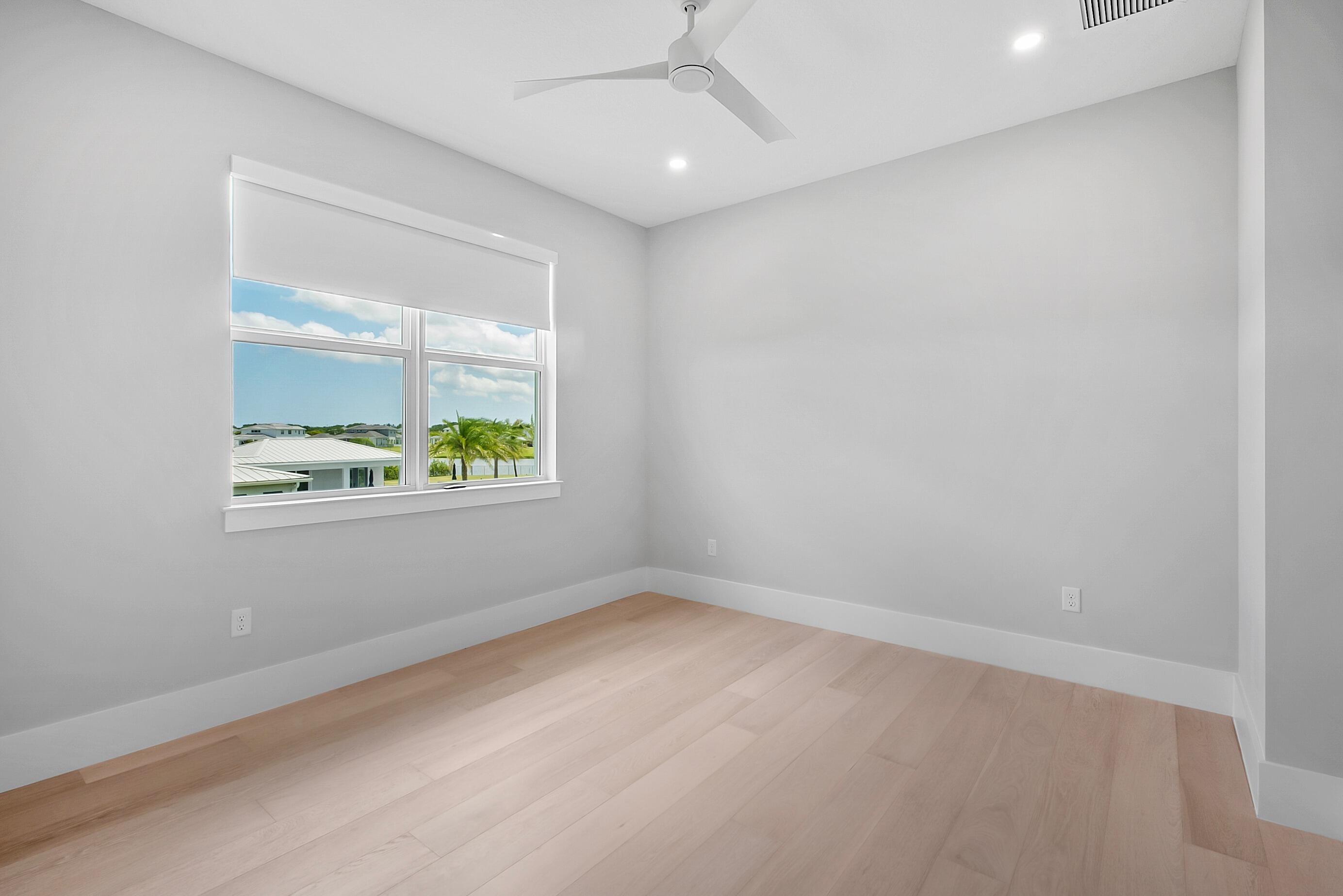 20060 Southeast Bridgewater Drive Jupiter, FL 33458 - Photo 38 of 68 an empty room with windows