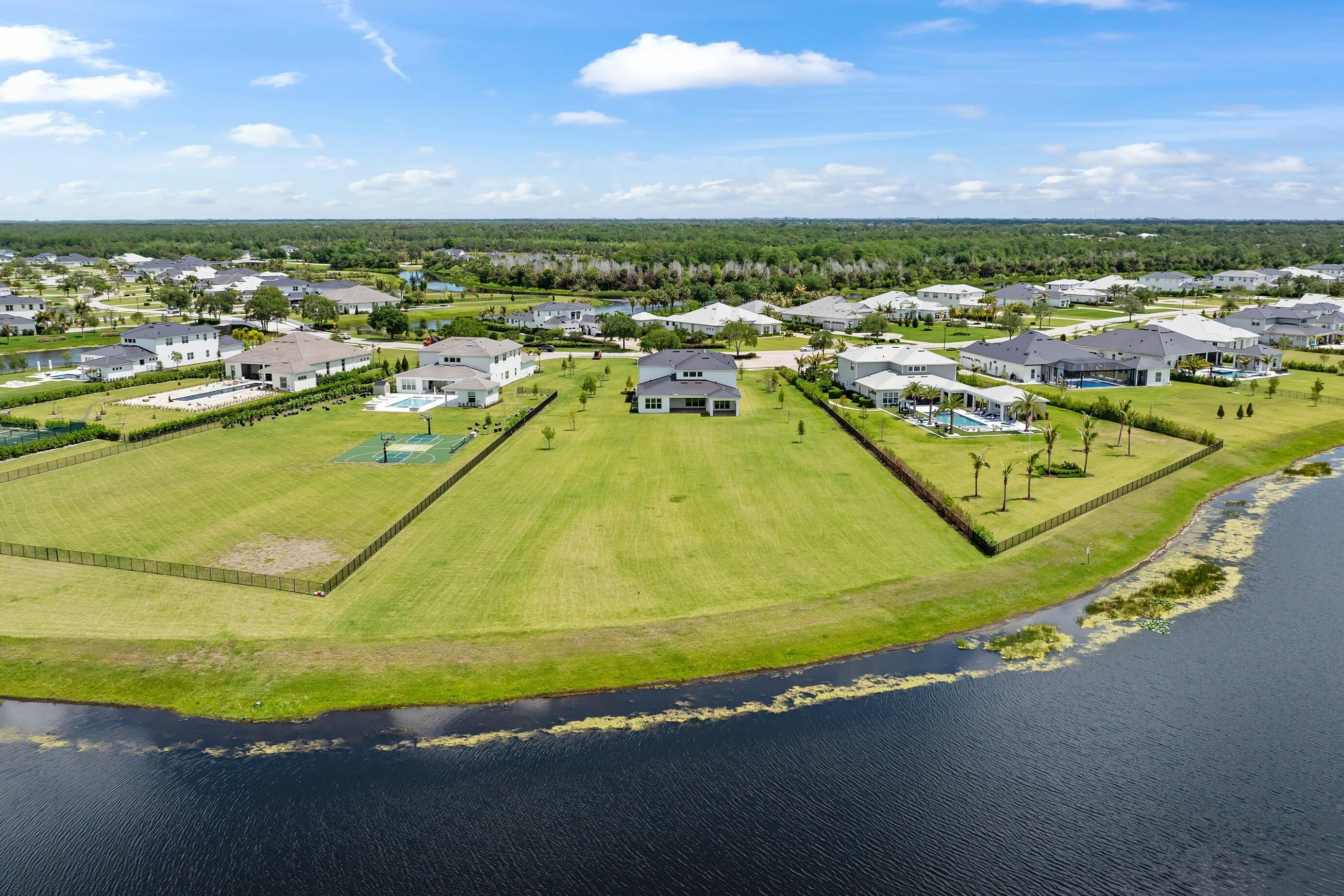 20060 Southeast Bridgewater Drive Jupiter, FL 33458 - Photo 56 of 68 a view of a swimming pool and lake view
