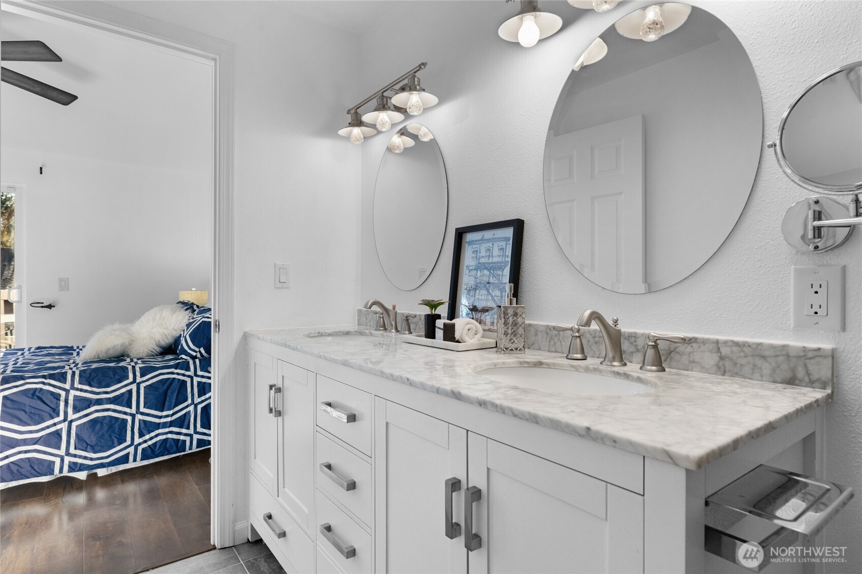 1555 Union Avenue Northeast, Unit 39 Renton, WA 98059 - Photo 17 of 19 a bathroom with a double vanity sink and a mirror