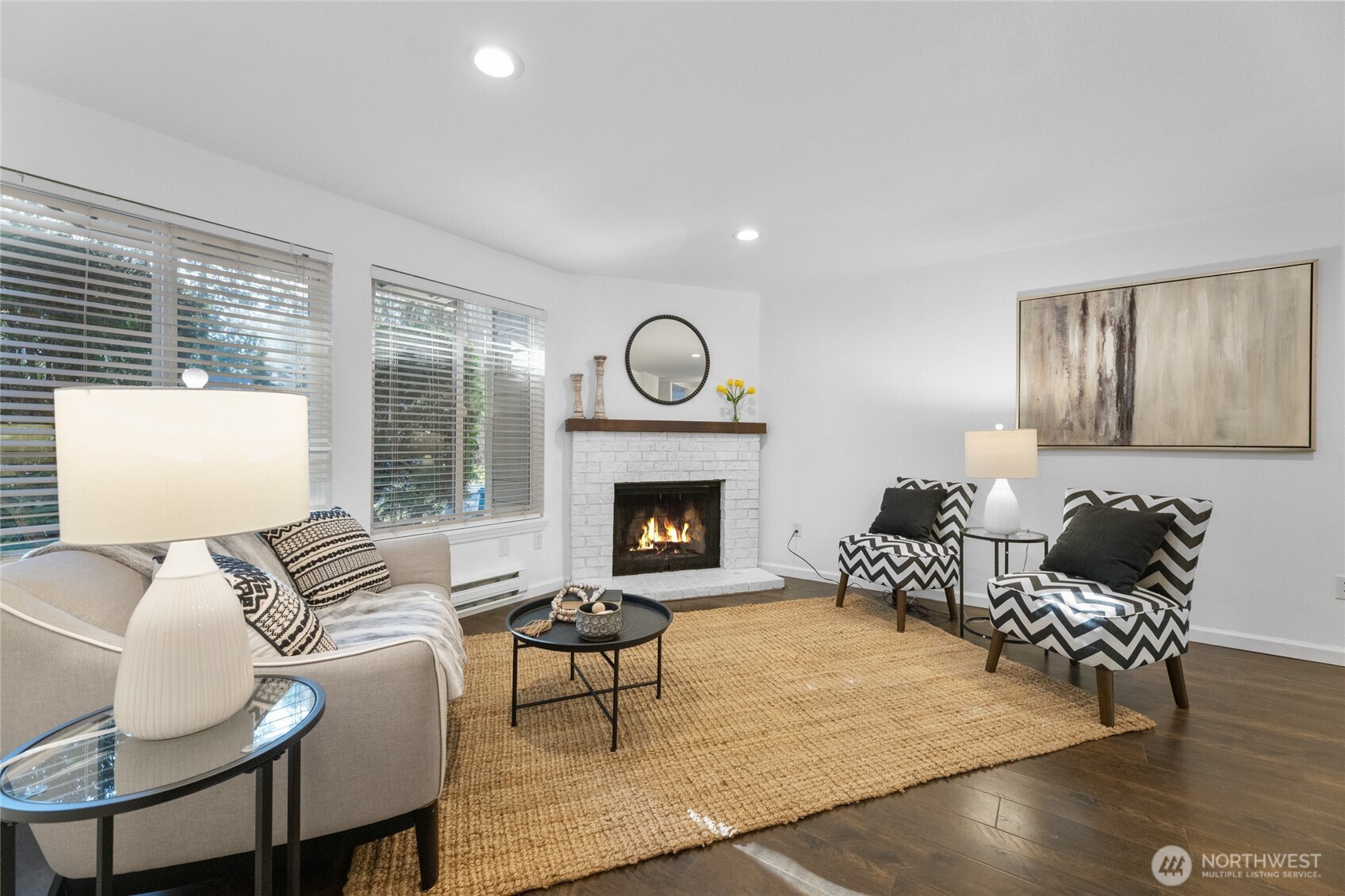 1555 Union Avenue Northeast, Unit 39 Renton, WA 98059 - Photo 2 of 19 a living room with furniture and a fireplace