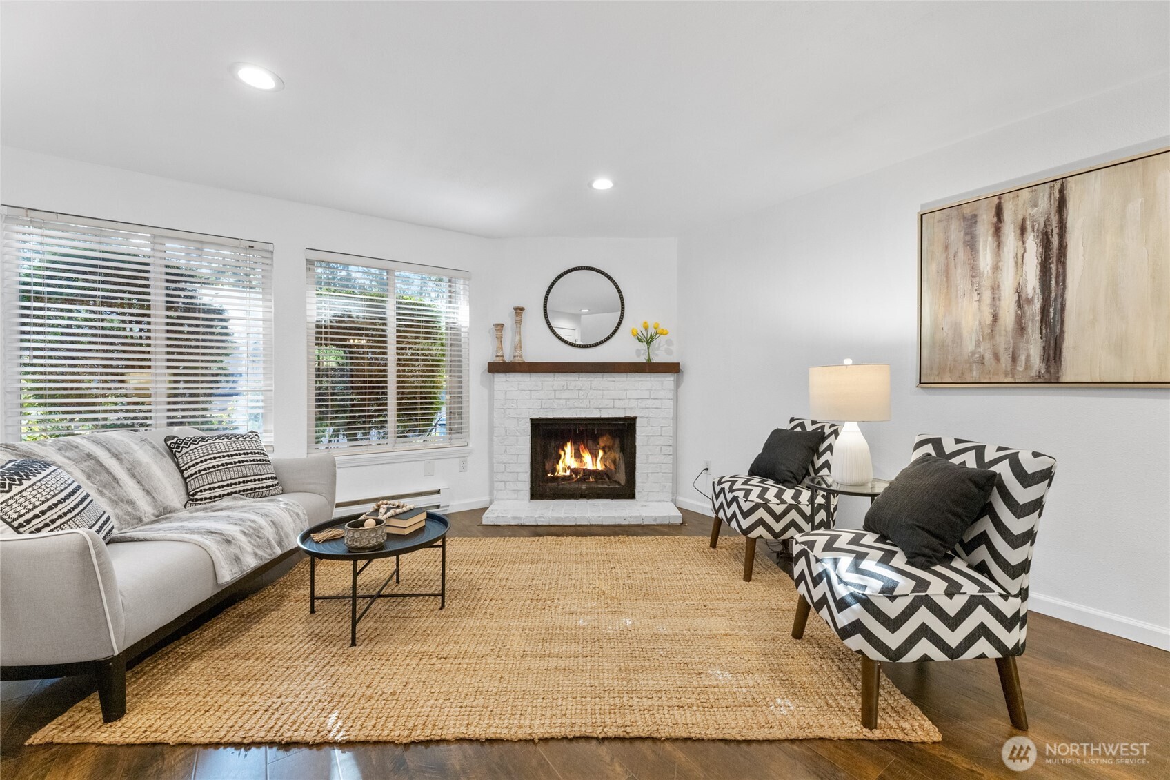 1555 Union Avenue Northeast, Unit 39 Renton, WA 98059 - Photo 3 of 19 a living room with furniture and a fireplace