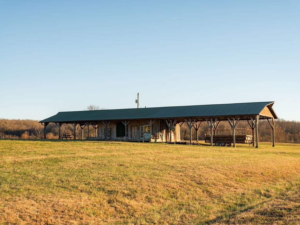 6415 Pinewood Road Nunnelly, TN 37137 - Photo 58 of 94 a view of swimming pool with an outdoor space and seating area