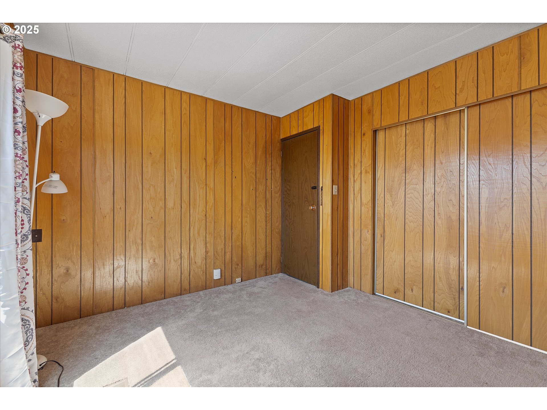 2902 East 2nd Street, Unit 110 Newberg, OR 97132 - Photo 20 of 29 a view of a room with a wooden walls