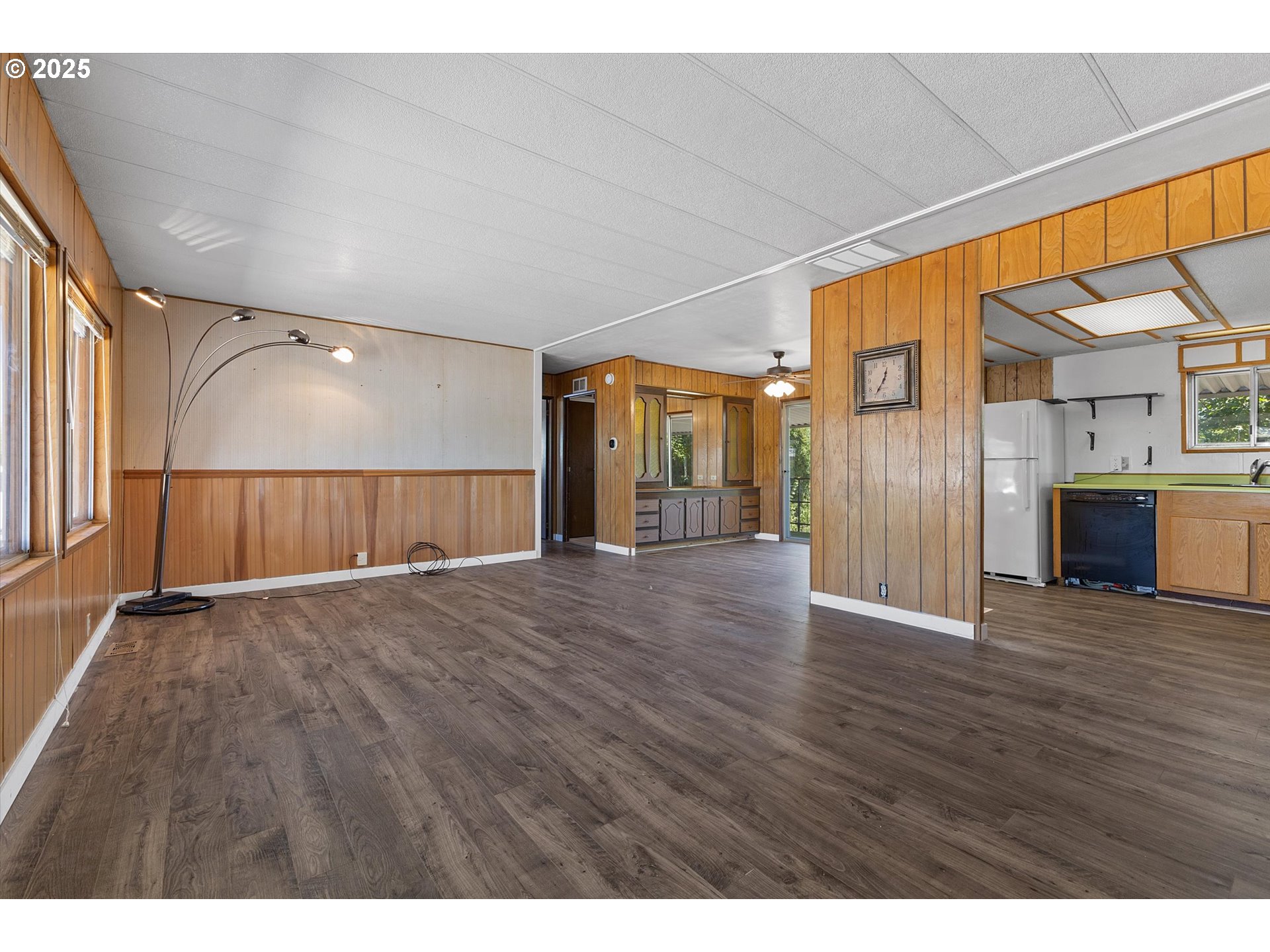 2902 East 2nd Street, Unit 110 Newberg, OR 97132 - Photo 3 of 29 a view of empty room with wooden floor