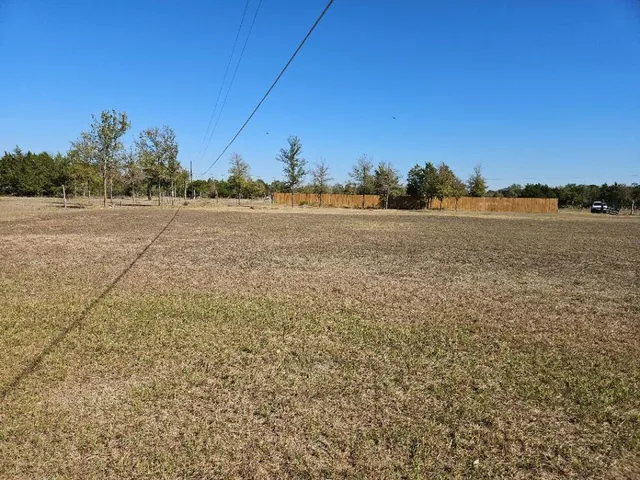 a view of lake with mountain in background