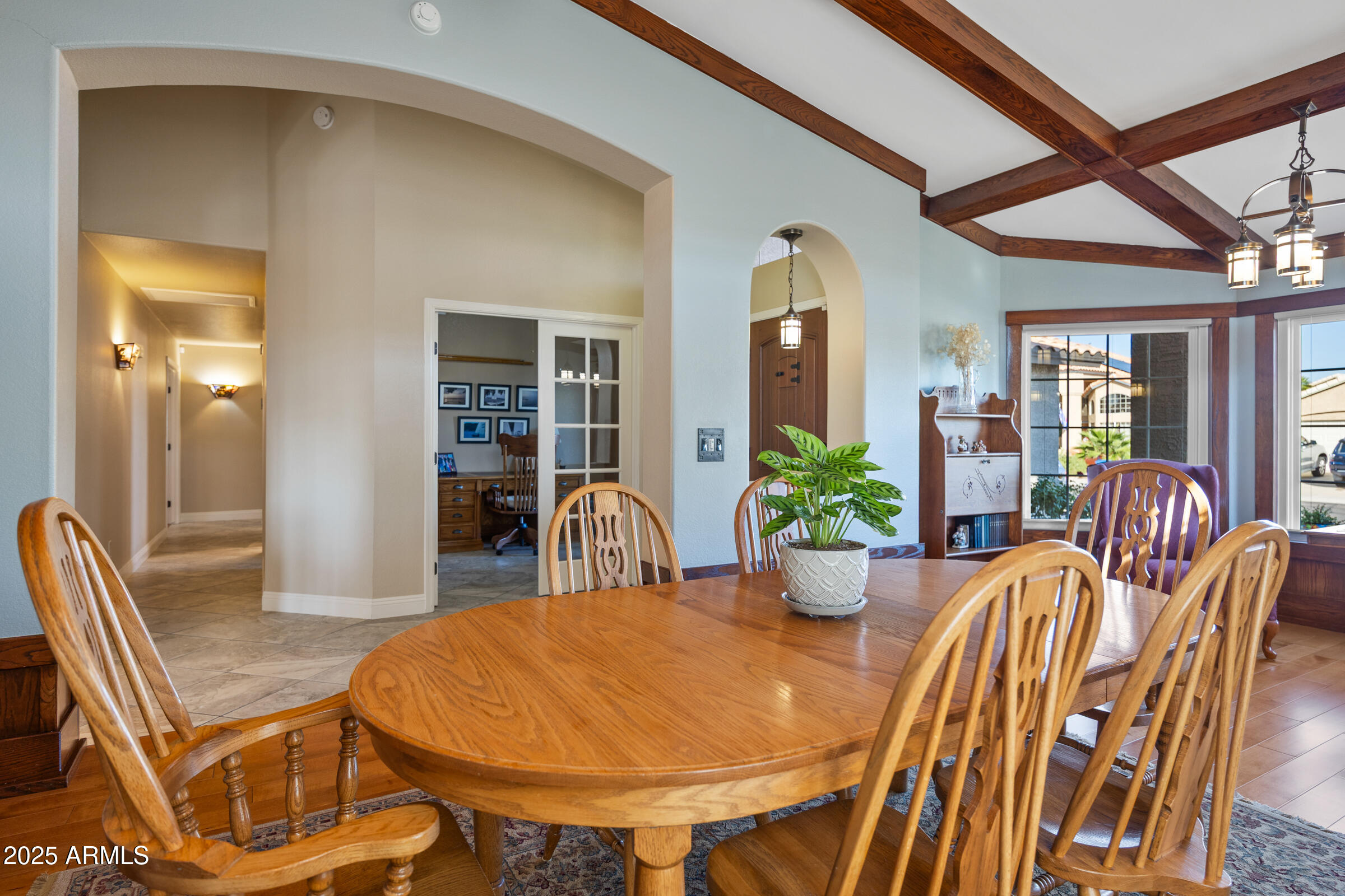 1111 West Lisa Lane Tempe, AZ 85284 - Photo 11 of 58 a view of a dining room with furniture and window