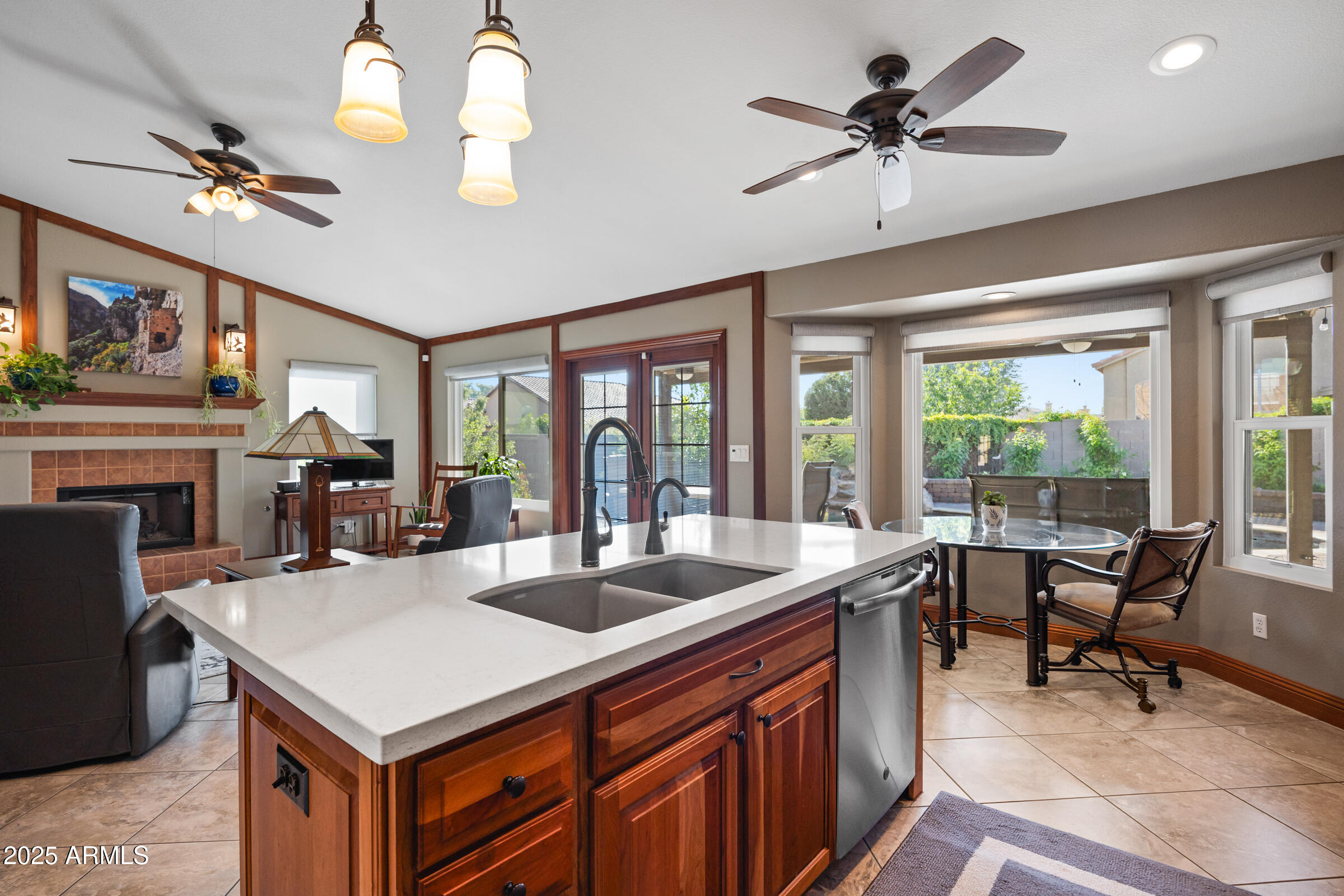1111 West Lisa Lane Tempe, AZ 85284 - Photo 19 of 58 a view of livingroom with kitchen island furniture and a large window