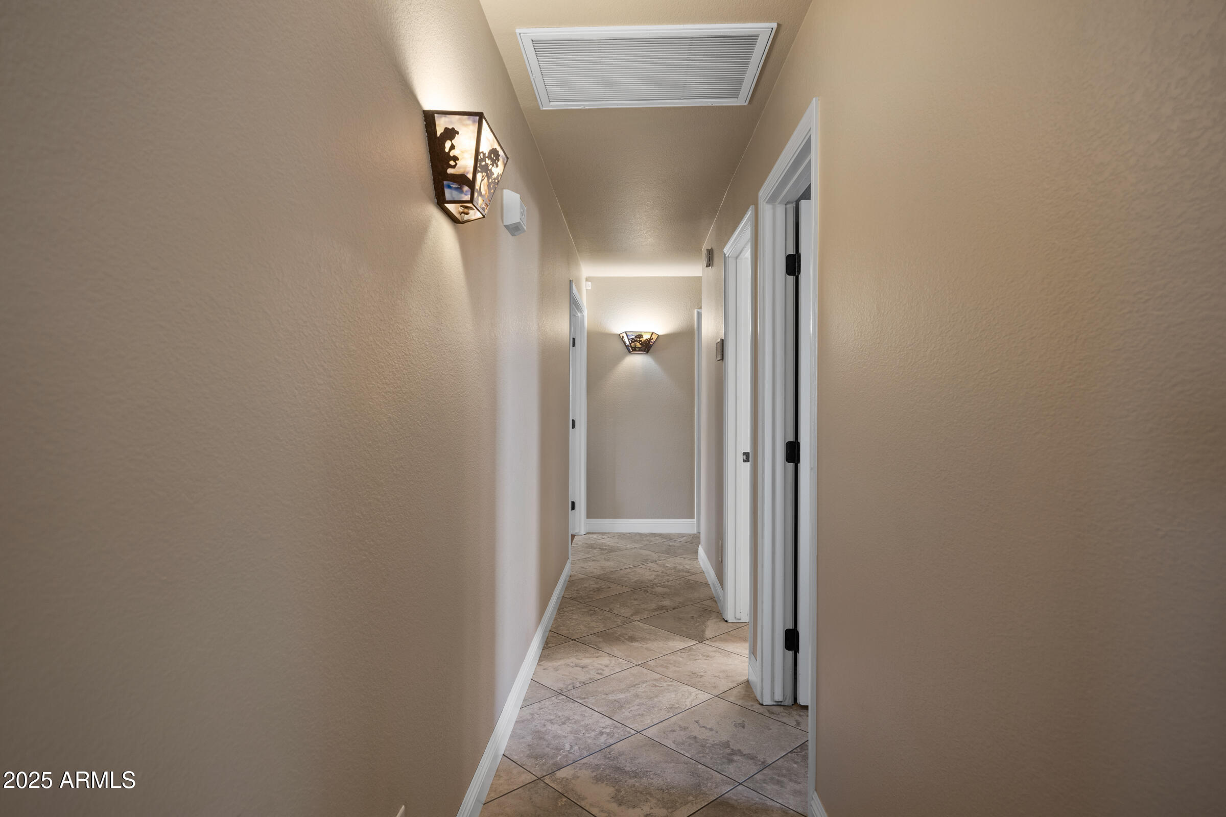 1111 West Lisa Lane Tempe, AZ 85284 - Photo 25 of 58 a view of a hallway with closet