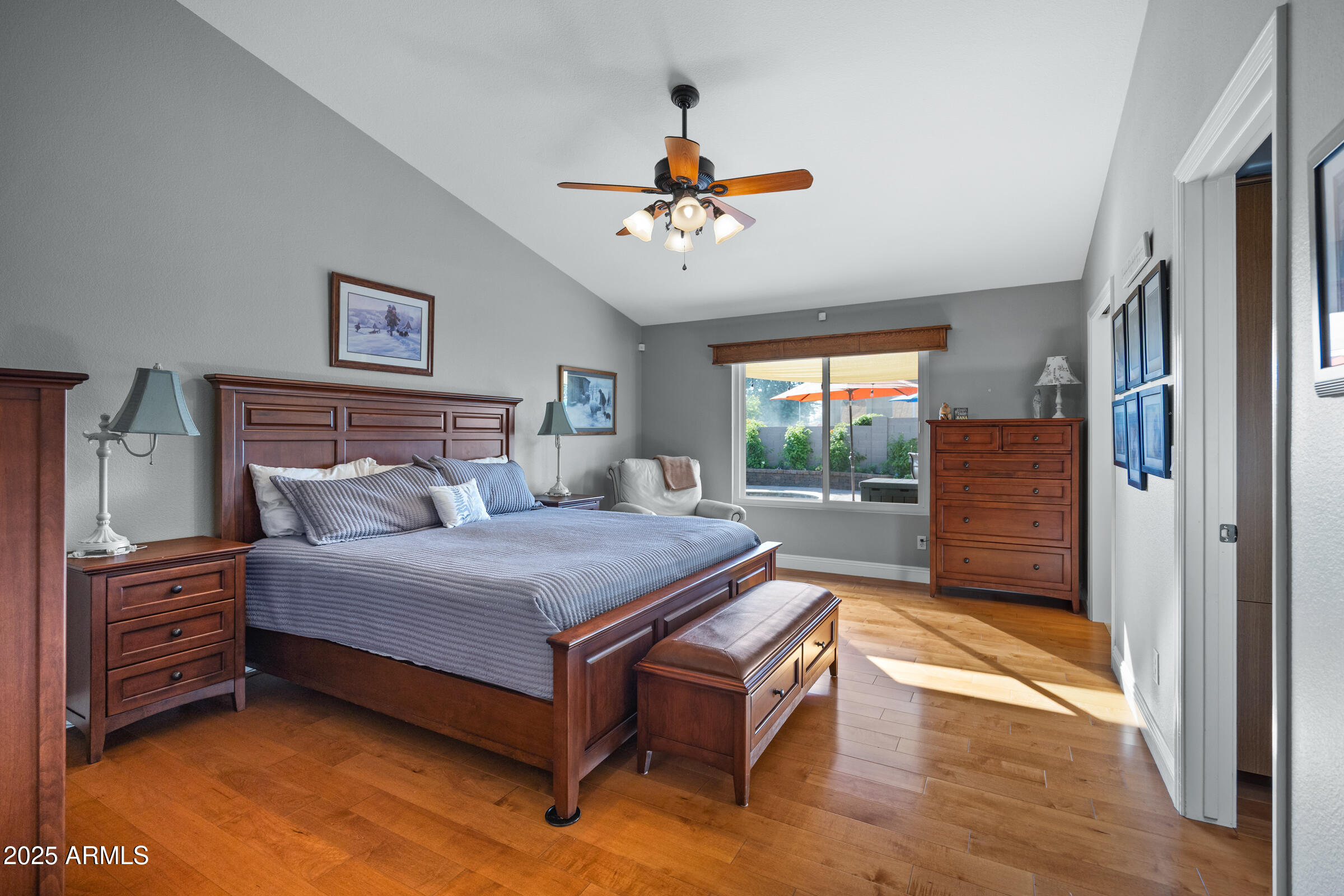 1111 West Lisa Lane Tempe, AZ 85284 - Photo 29 of 58 a bedroom with a bed and a chandelier