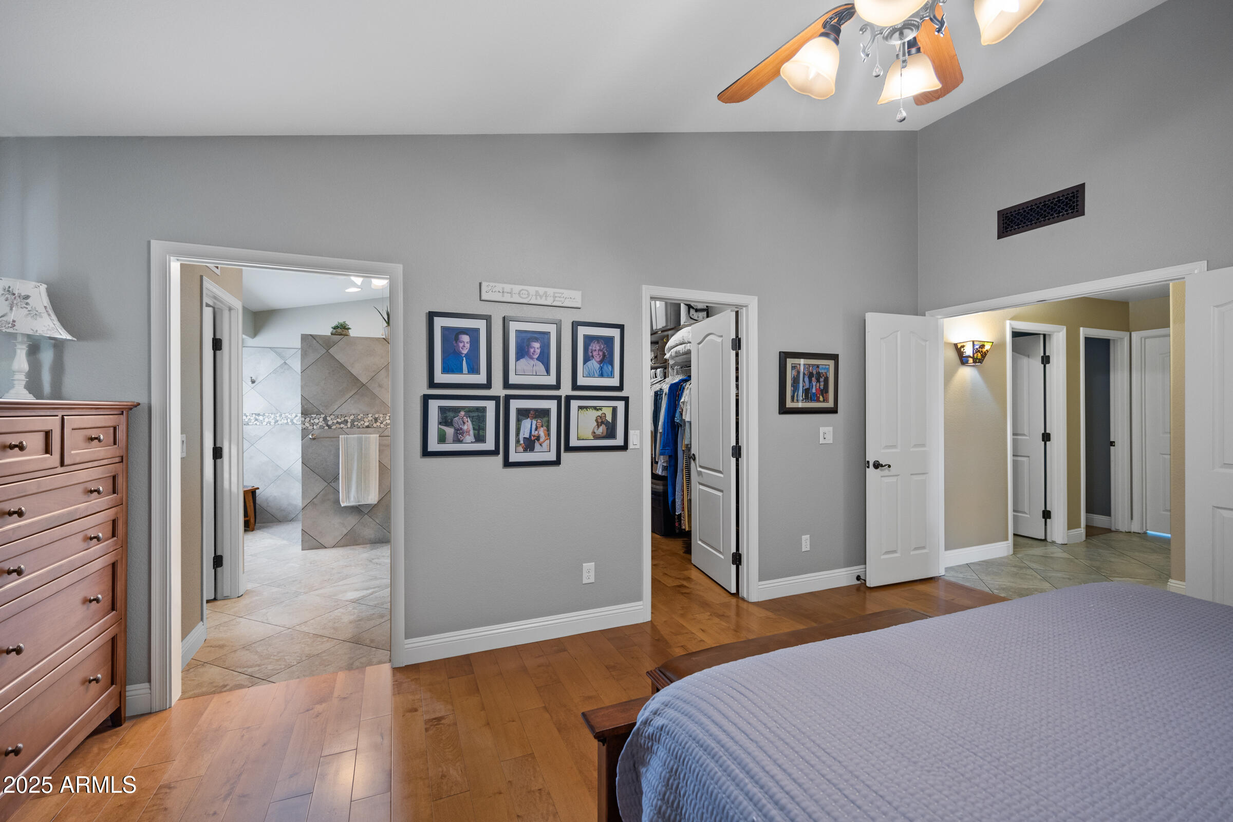 1111 West Lisa Lane Tempe, AZ 85284 - Photo 31 of 58 a bedroom with a bed and a mirror