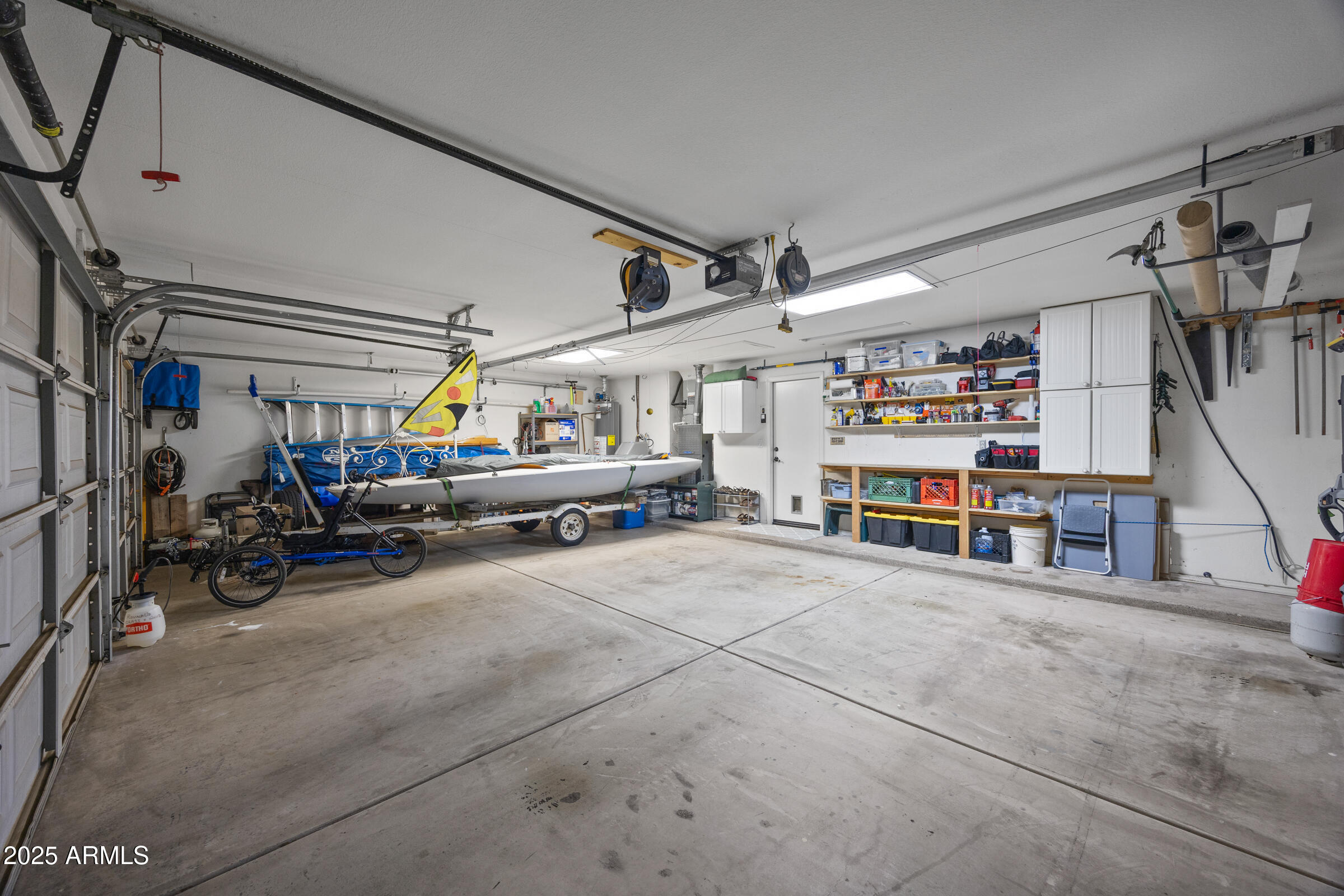 1111 West Lisa Lane Tempe, AZ 85284 - Photo 37 of 58 a view of a garage with storage