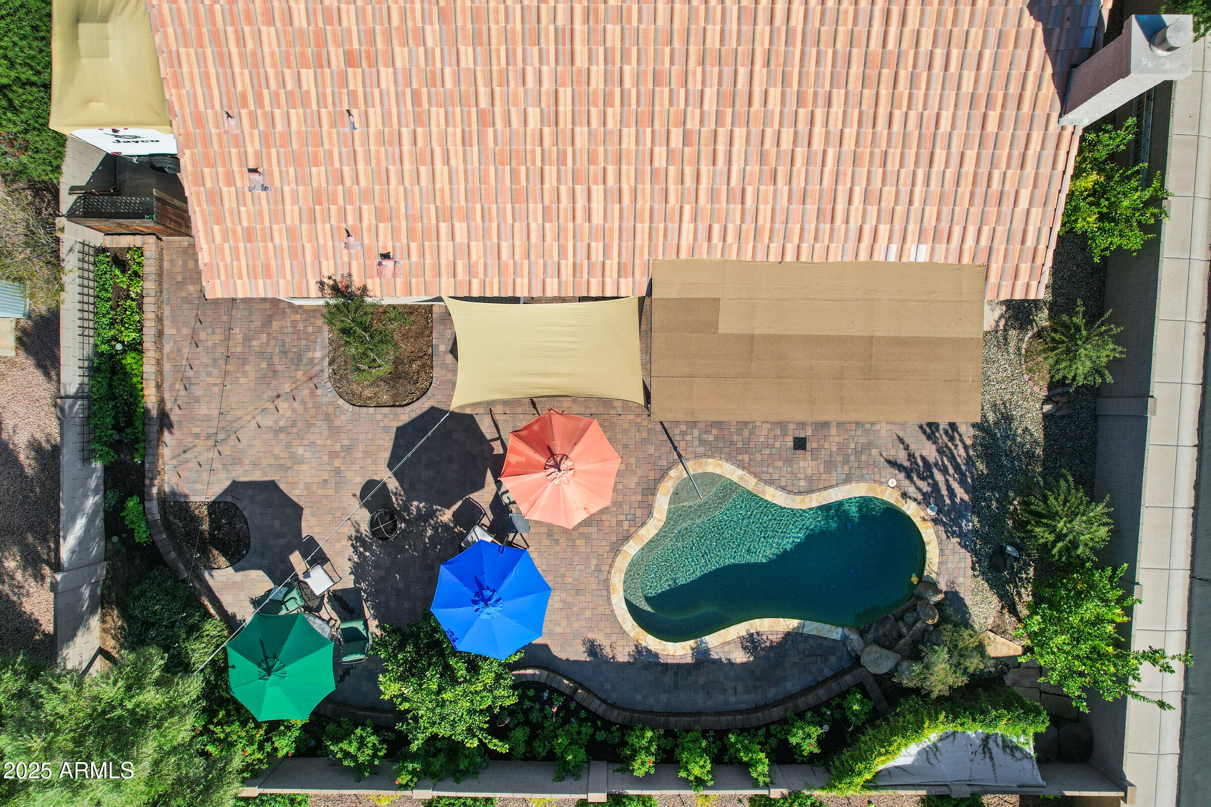 1111 West Lisa Lane Tempe, AZ 85284 - Photo 52 of 58 an aerial view of a house with swimming pool and outdoor seating