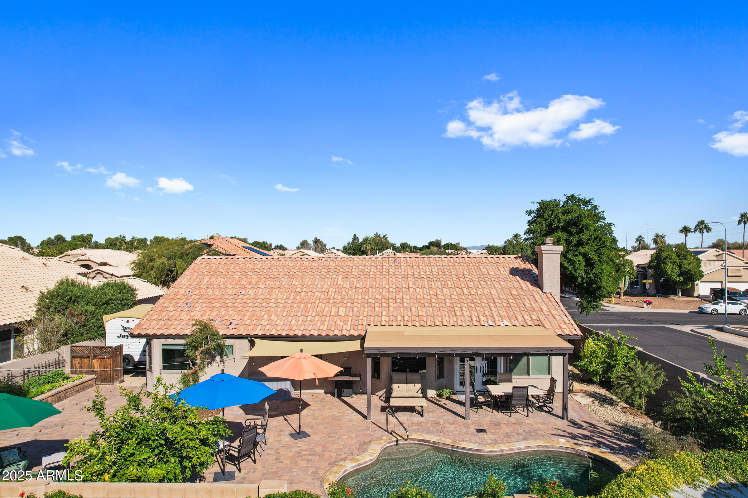 1111 West Lisa Lane Tempe, AZ 85284 - Photo 54 of 58 a view of a house with swimming pool patio and outdoor seating