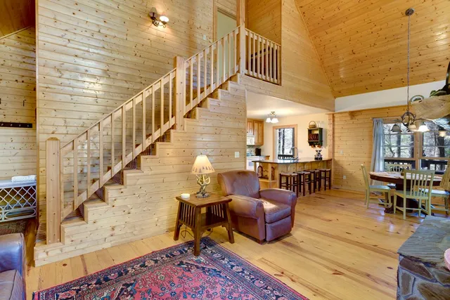 a view of a livingroom with furniture and wooden floor