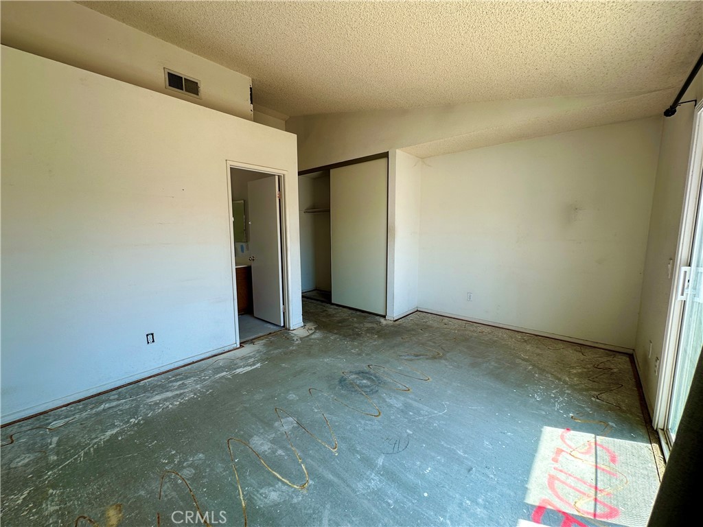 29784 Berea Road Menifee, CA 92584 - Photo 10 of 24 an empty room with windows