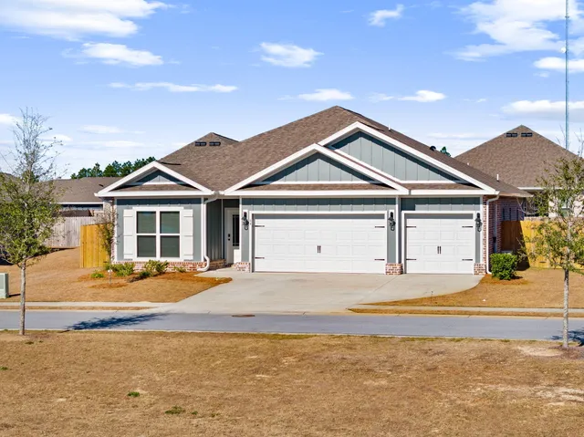 a front view of a house with a ocean view