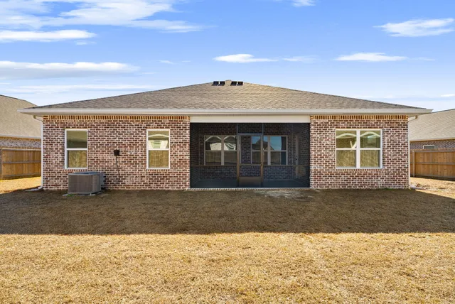 an aerial view of a city with lots of residential buildings in ocean