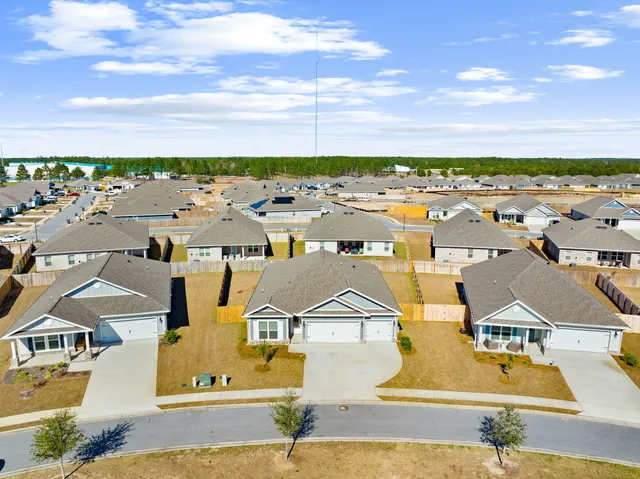 a view of a house with swimming pool