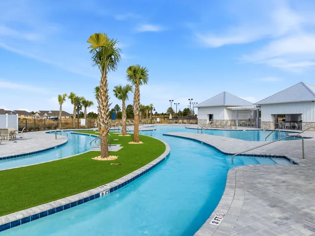a view of a house with swimming pool
