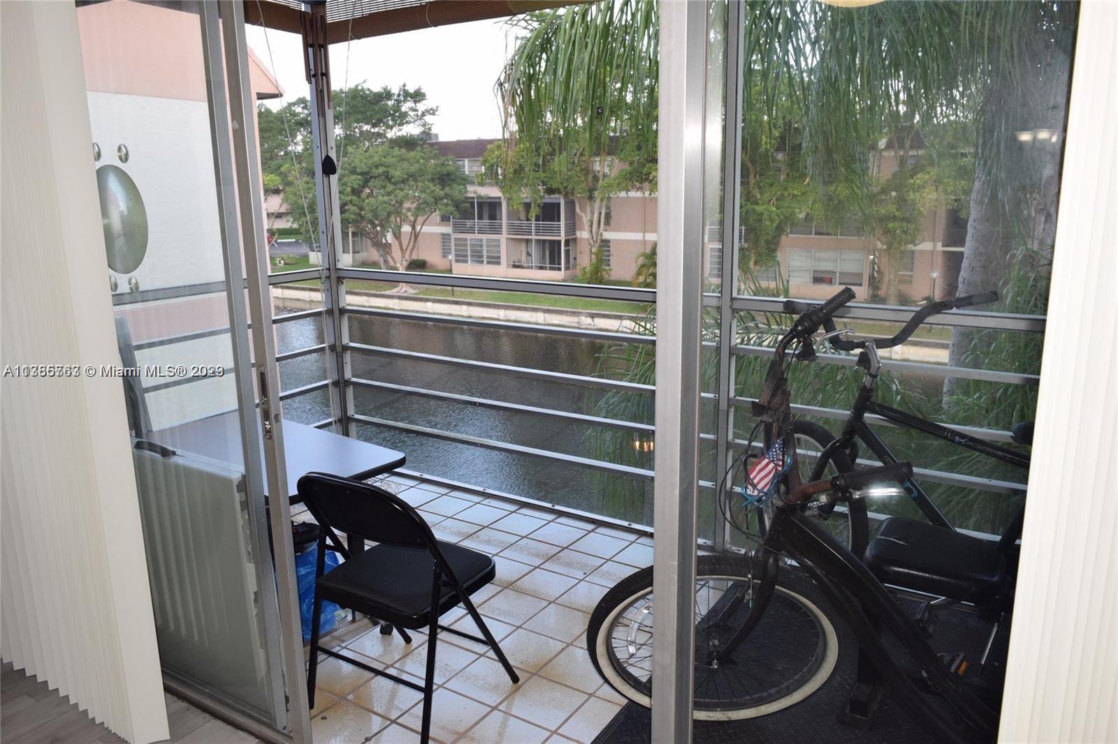 8330 Sands Point Boulevard, Unit N306 Tamarac, FL 33321 - Photo 17 of 20 a room with musical instruments