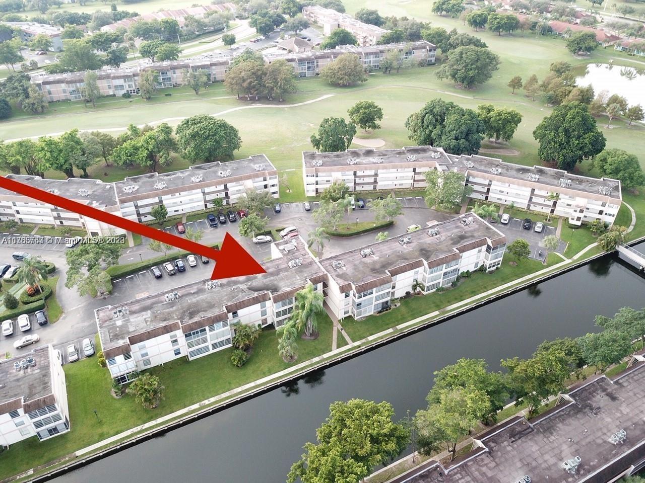 8330 Sands Point Boulevard, Unit N306 Tamarac, FL 33321 - Photo 3 of 20 a view of swimming pool from a balcony