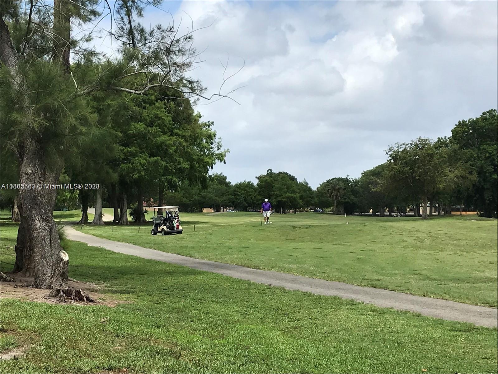 8330 Sands Point Boulevard, Unit N306 Tamarac, FL 33321 - Photo 5 of 20 a view of a park