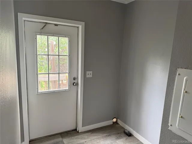 a view of a room that has a window