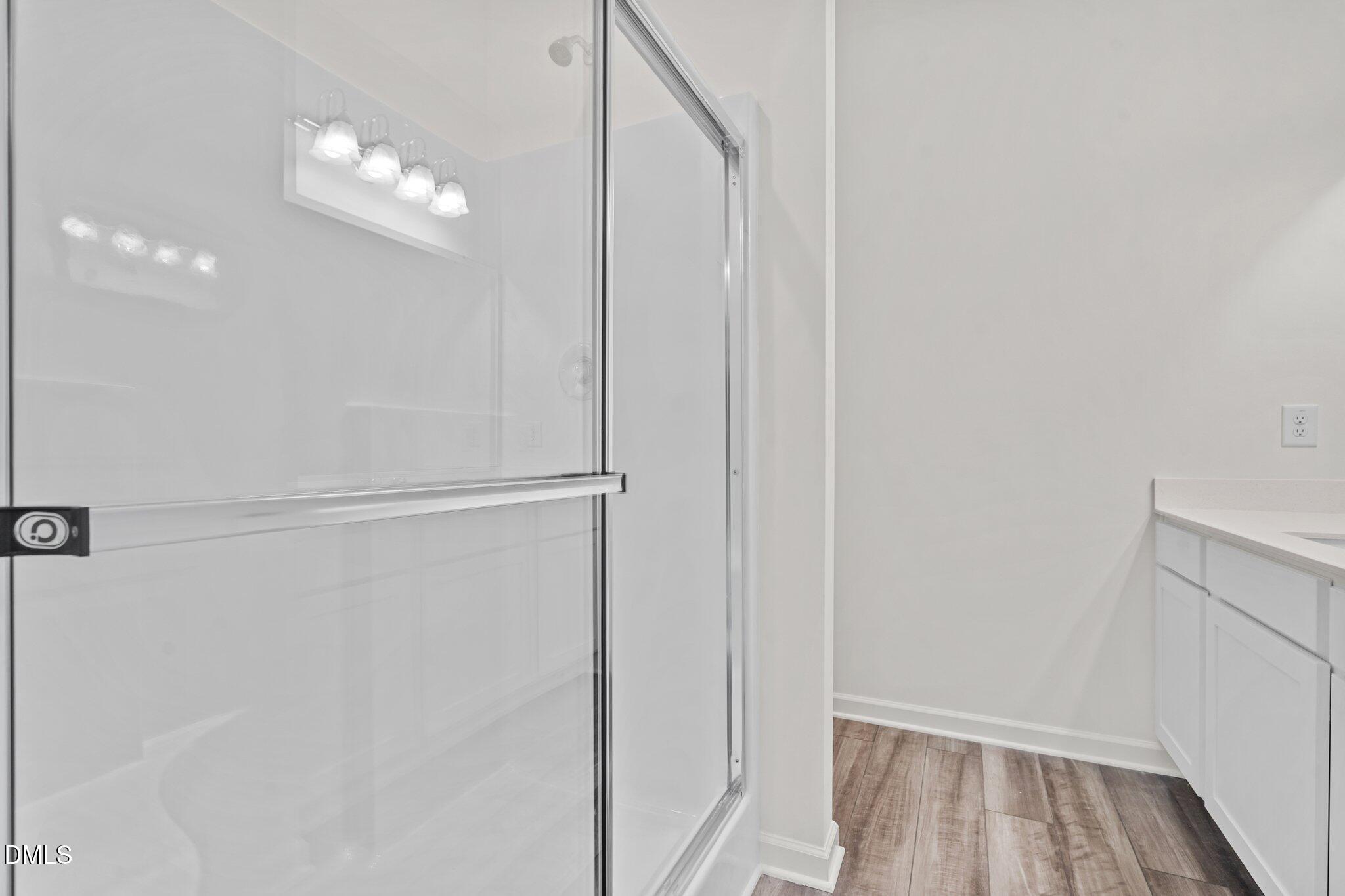 305 Cherubic Way Rolesville, NC 27571 - Photo 26 of 29 a view of a livingroom with wooden floor