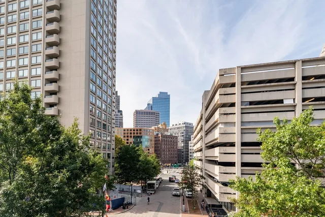 a view of a city with tall buildings