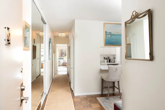 a view of bathroom with a sink and mirror