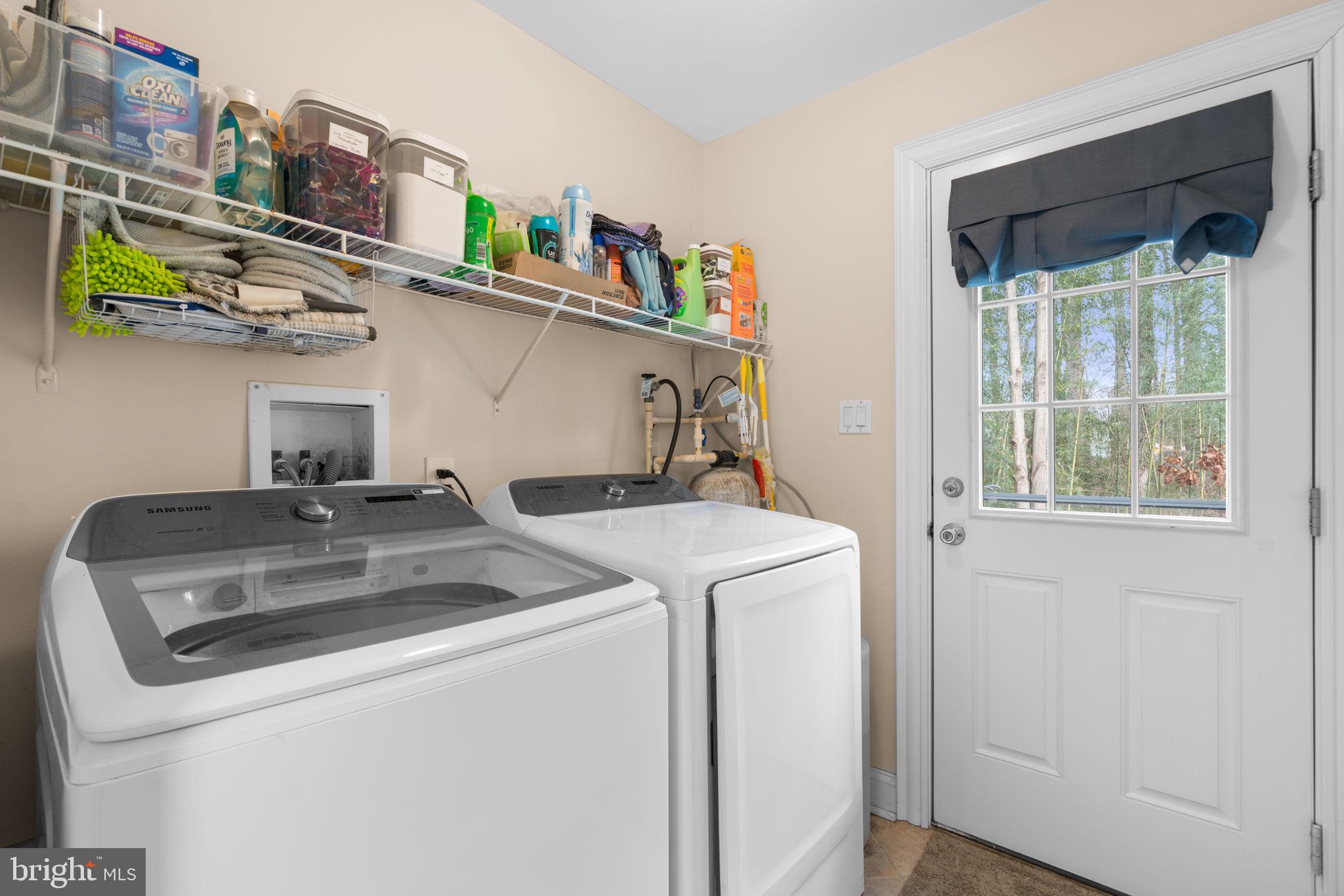 791 Central Avenue East Edgewater, MD 21037 - Photo 19 of 54 a utility room with dryer and washer