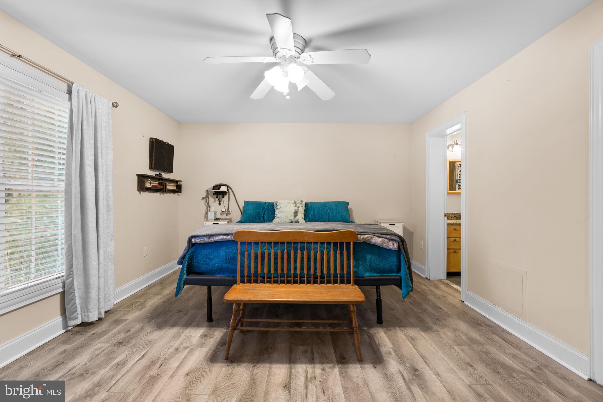 791 Central Avenue East Edgewater, MD 21037 - Photo 23 of 54 a bedroom with a bed and a window