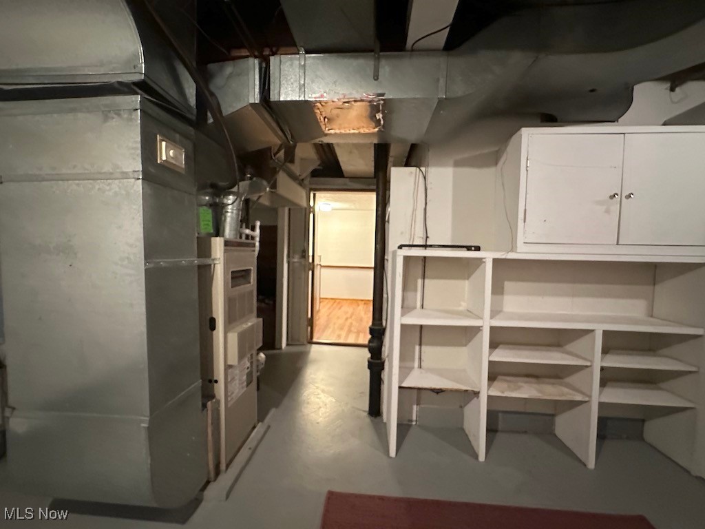 6482 State Road, Unit E1 Parma, OH 44134 - Photo 45 of 48 Unfinished below grade area featuring heating unit
