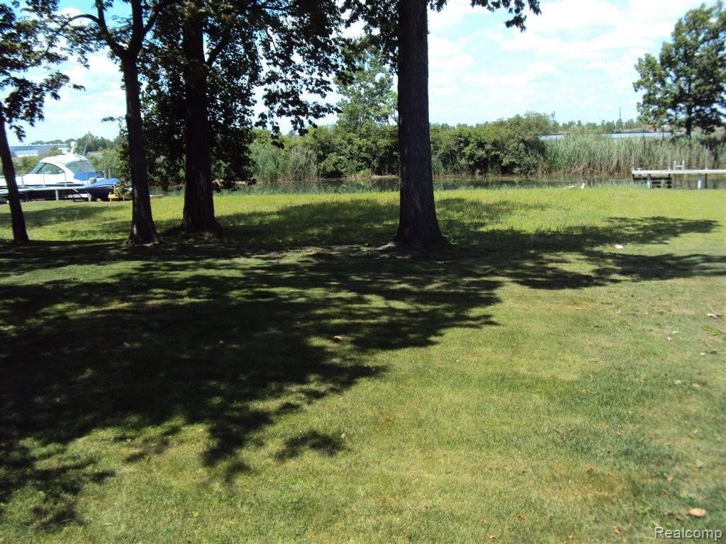 18014 Meridian Road Grosse Ile, MI 48138 - Photo 17 of 25 Great backyard