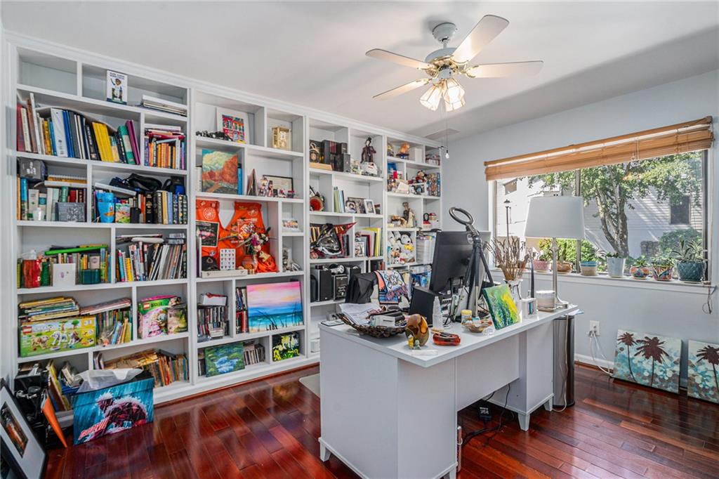 3813 Paces Ferry West Atlanta, GA 30339 - Photo 8 of 22 a work room with furniture and a book shelf