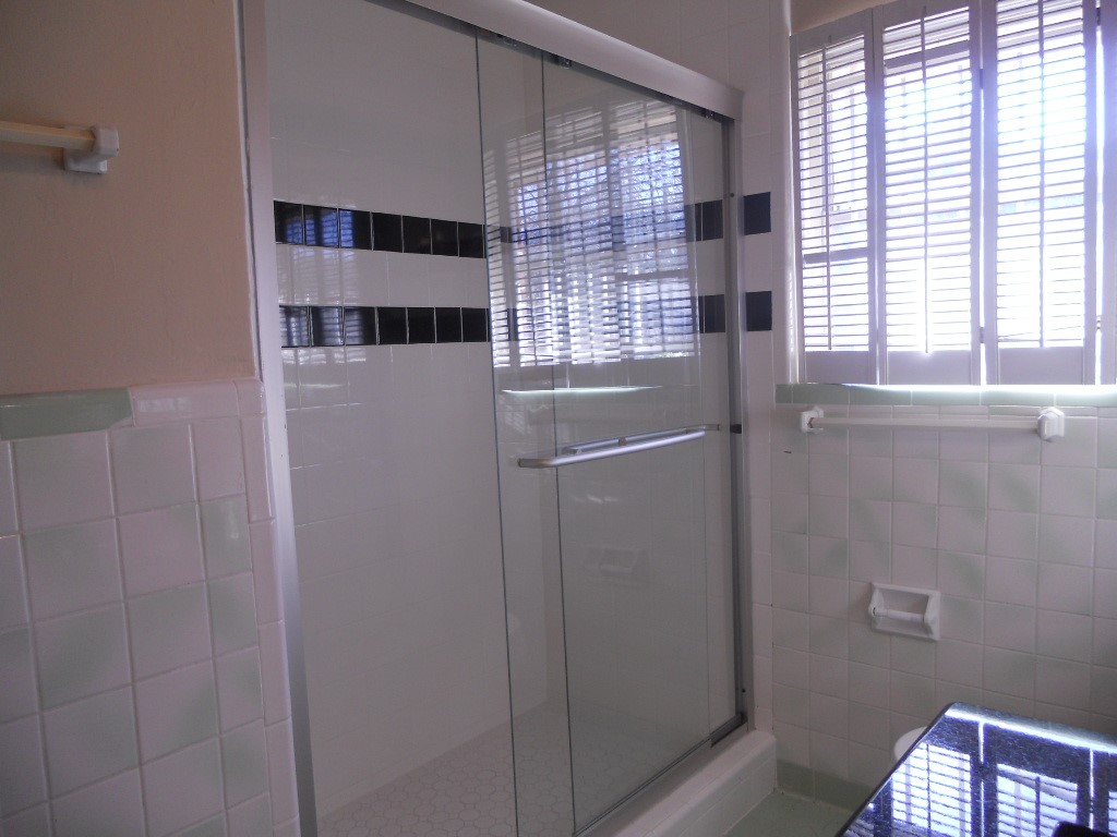 4709 Sanford Road Houston, TX 77035 - Photo 14 of 19 a view of walk in closet with window