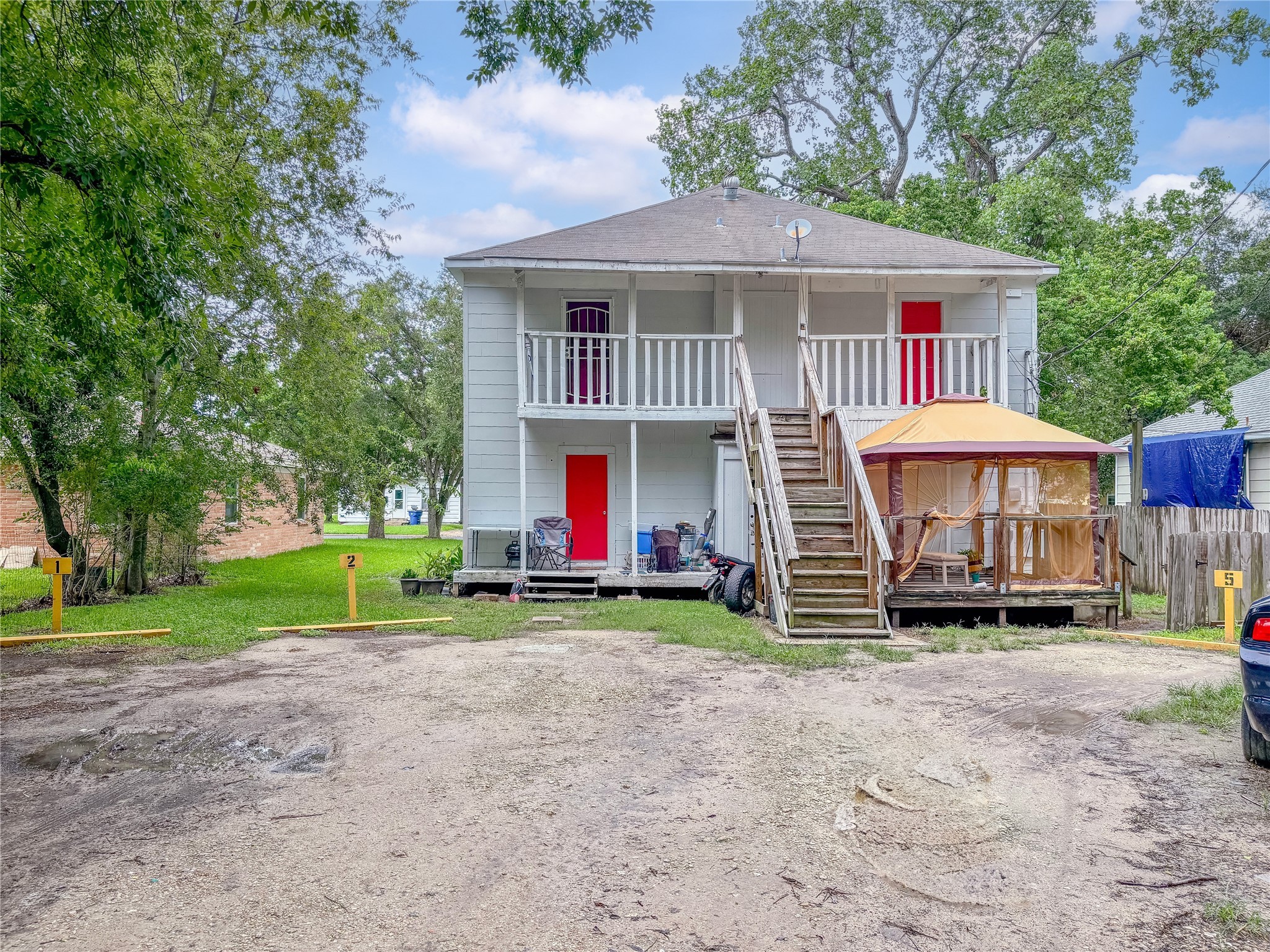 315 8th Avenue North, Unit 4 Texas City, TX 77590 - Photo 6 of 7 a front view of house with yard and green space