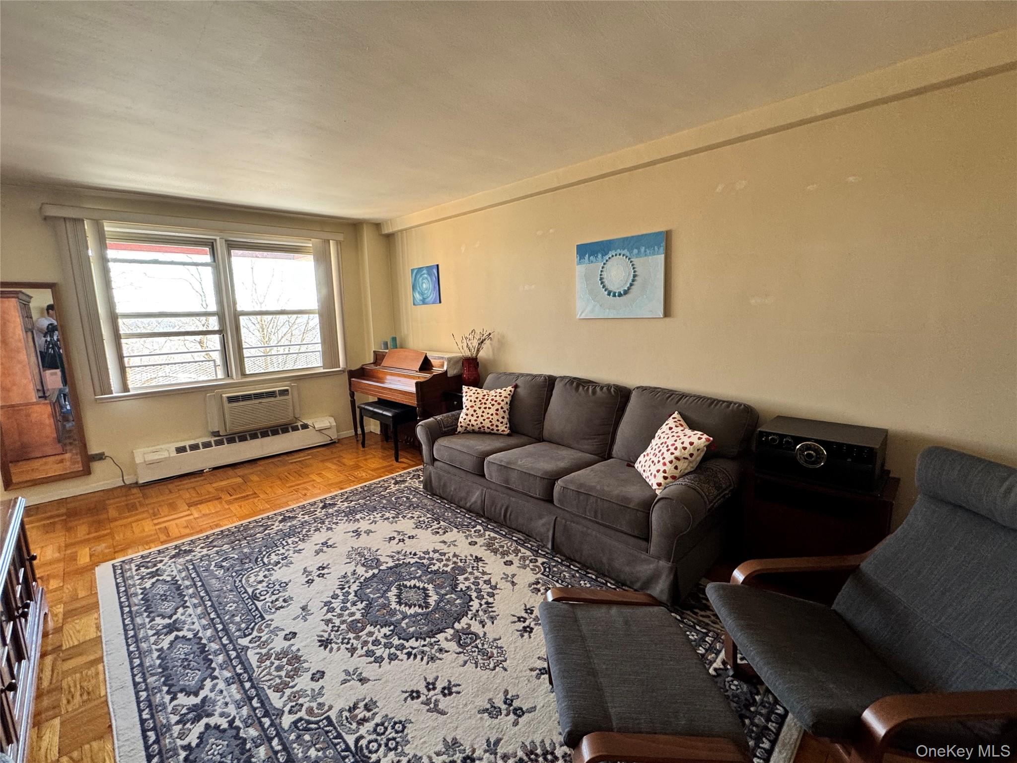 5500 Fieldston Road, Unit 3DD Bronx, NY 10471 - Photo 2 of 24 a living room with furniture and a rug