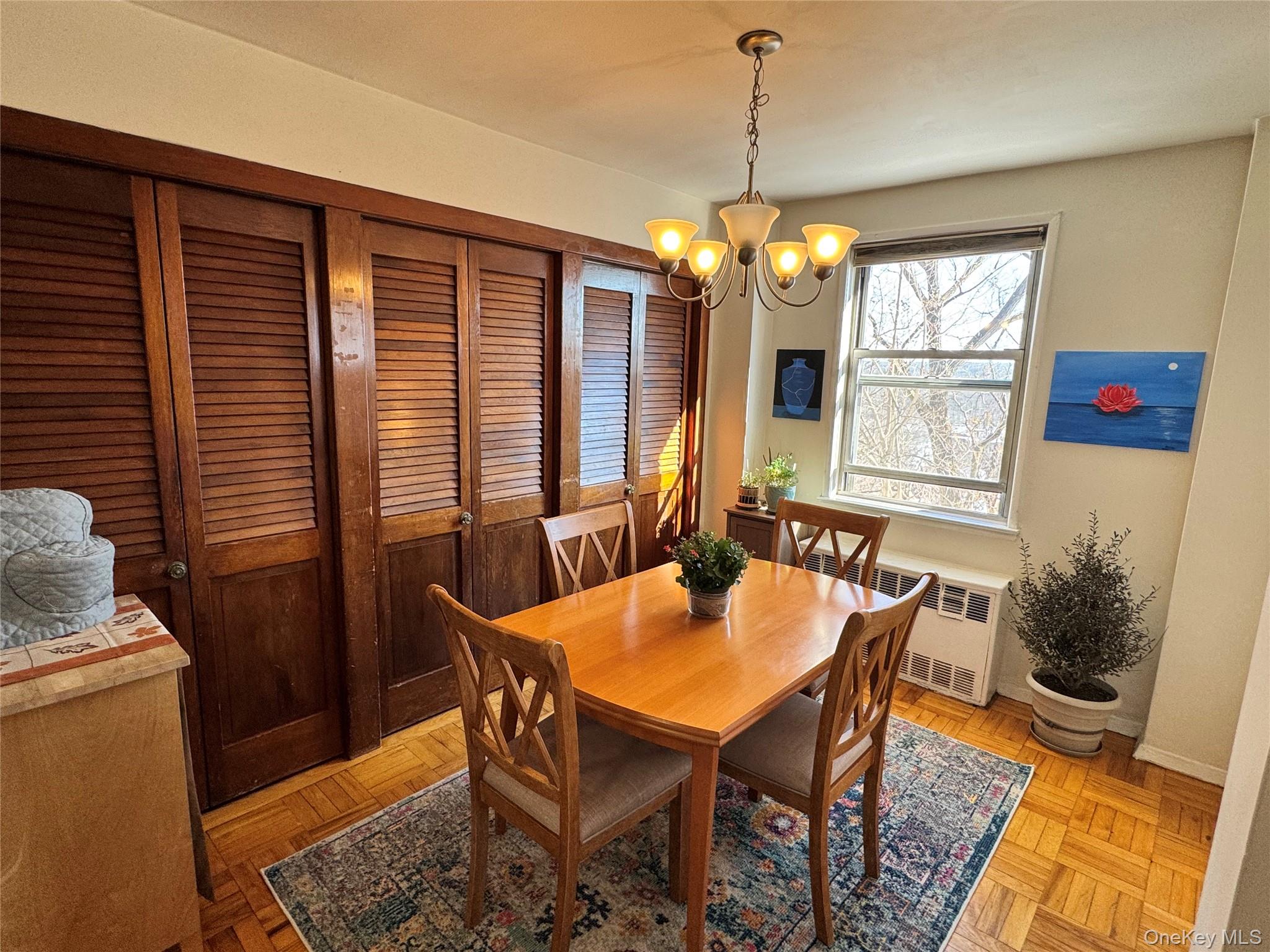 5500 Fieldston Road, Unit 3DD Bronx, NY 10471 - Photo 3 of 24 a view of a dining room with furniture window and wooden floor